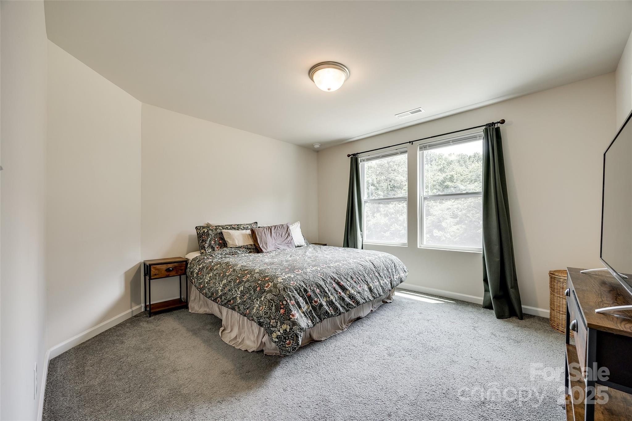 415 Kickapoo Avenue Gastonia, NC 28056 - Photo 18 of 24 a bedroom with a bed and a window