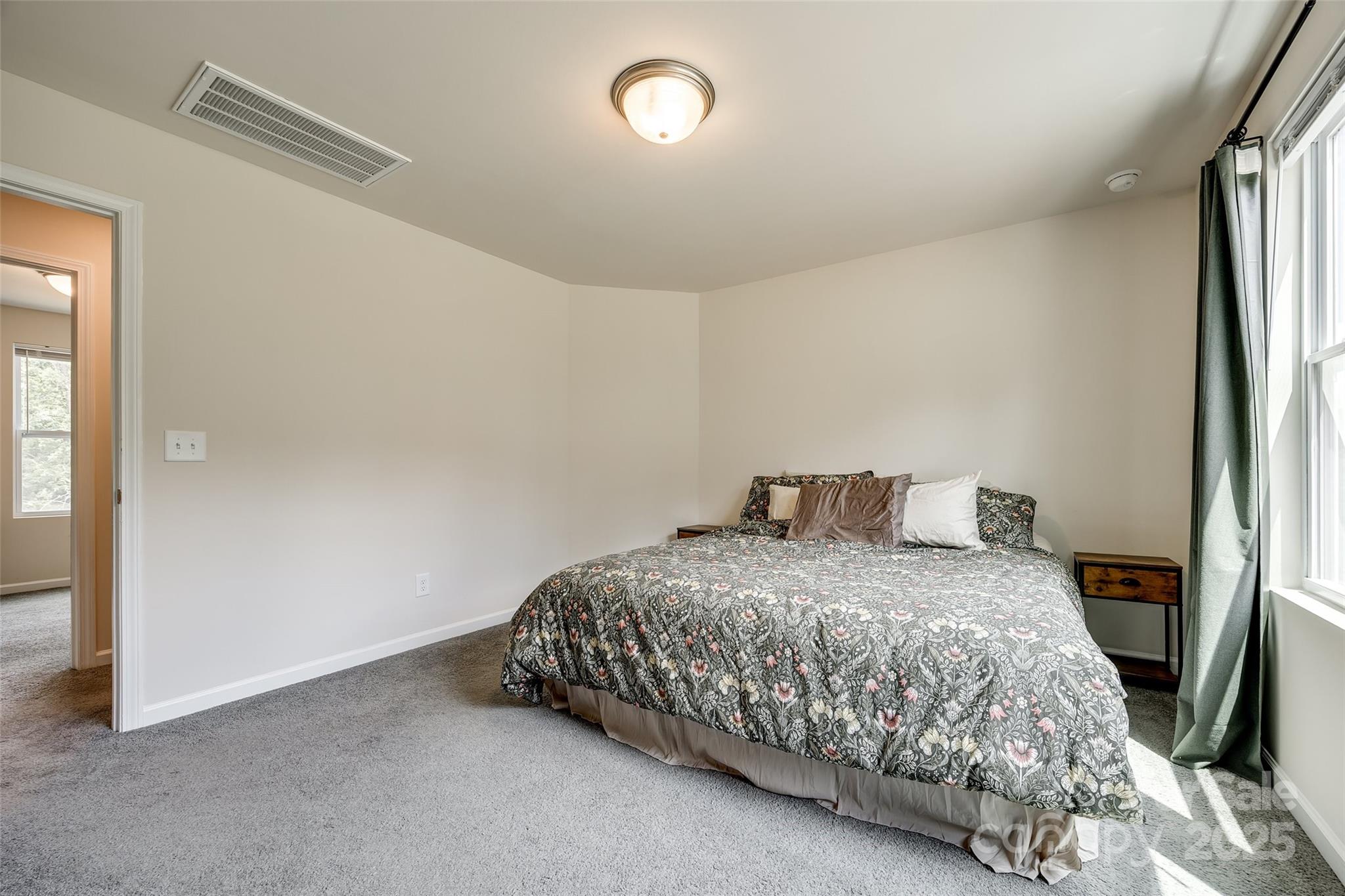 415 Kickapoo Avenue Gastonia, NC 28056 - Photo 19 of 24 a bedroom with a bed and a window