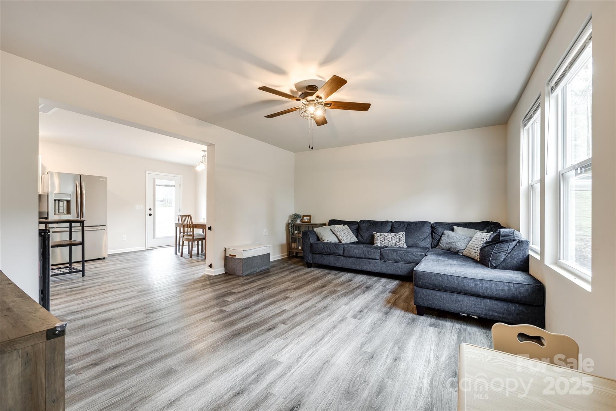 415 Kickapoo Avenue Gastonia, NC 28056 - Photo 5 of 24 a living room with furniture and a large window