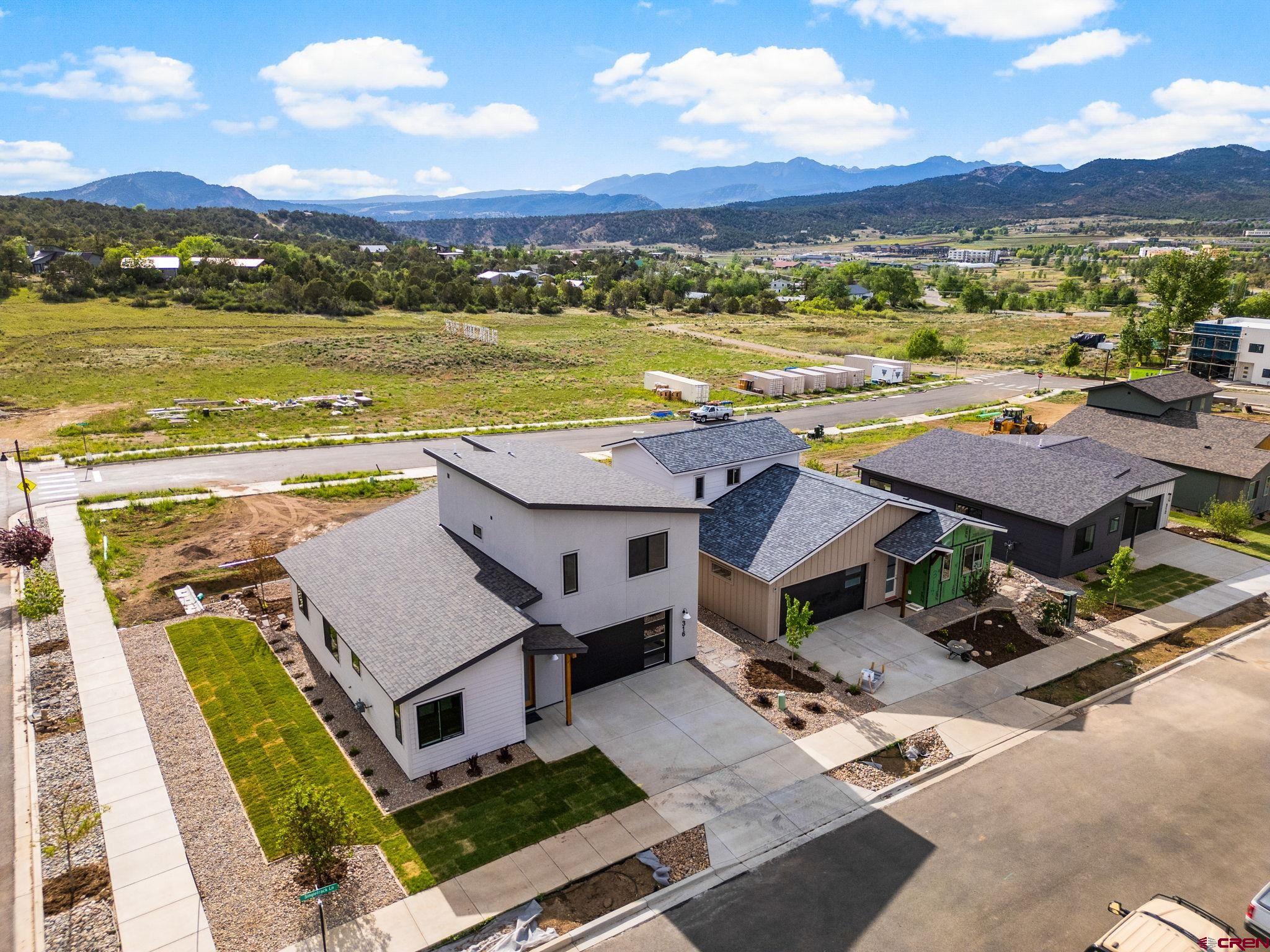 316 Singletrack Lane Durango, CO 81303 - Photo 32 of 34 a view of a terrace with a table and chairs