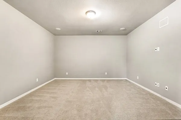 an empty room with a workbench