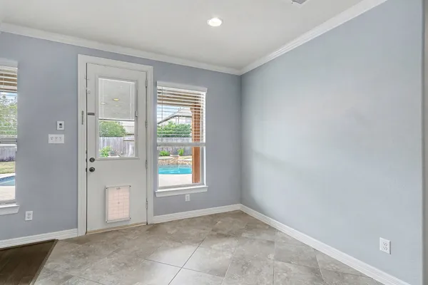 an empty room with windows