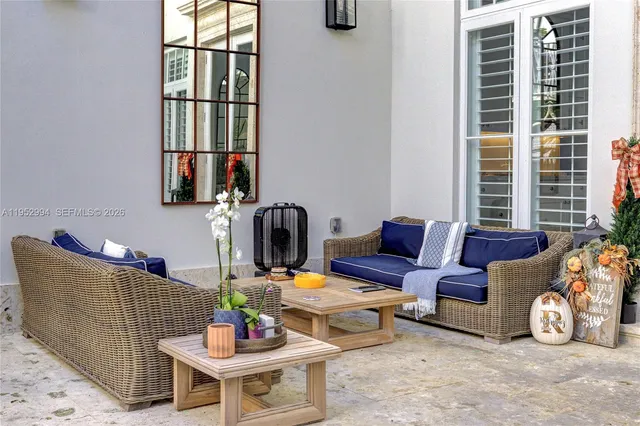 a outdoor living space with furniture and a window