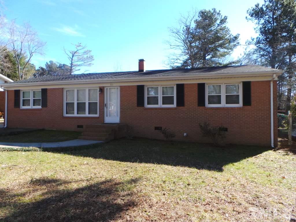 311 Pine Tree Road Oxford, NC 27565 - Photo 2 of 19 From another angle, this shows the front view again. The home being all brick is low maintenance as it has vinyl soffits.