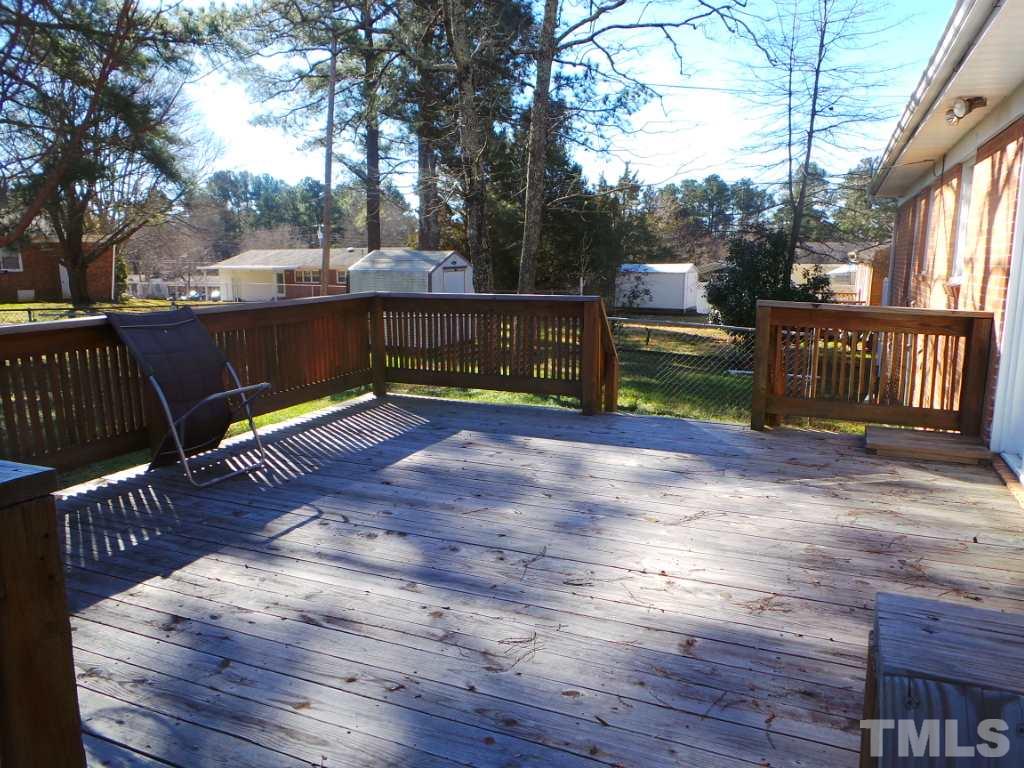 311 Pine Tree Road Oxford, NC 27565 - Photo 16 of 19 From the end of the driveway, this photo was taken from the steps to the large deck. The deck flooring was replaced last year, so it is ready to enjoy.
