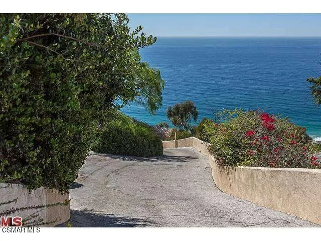 a view of a chairs and tables in the patio