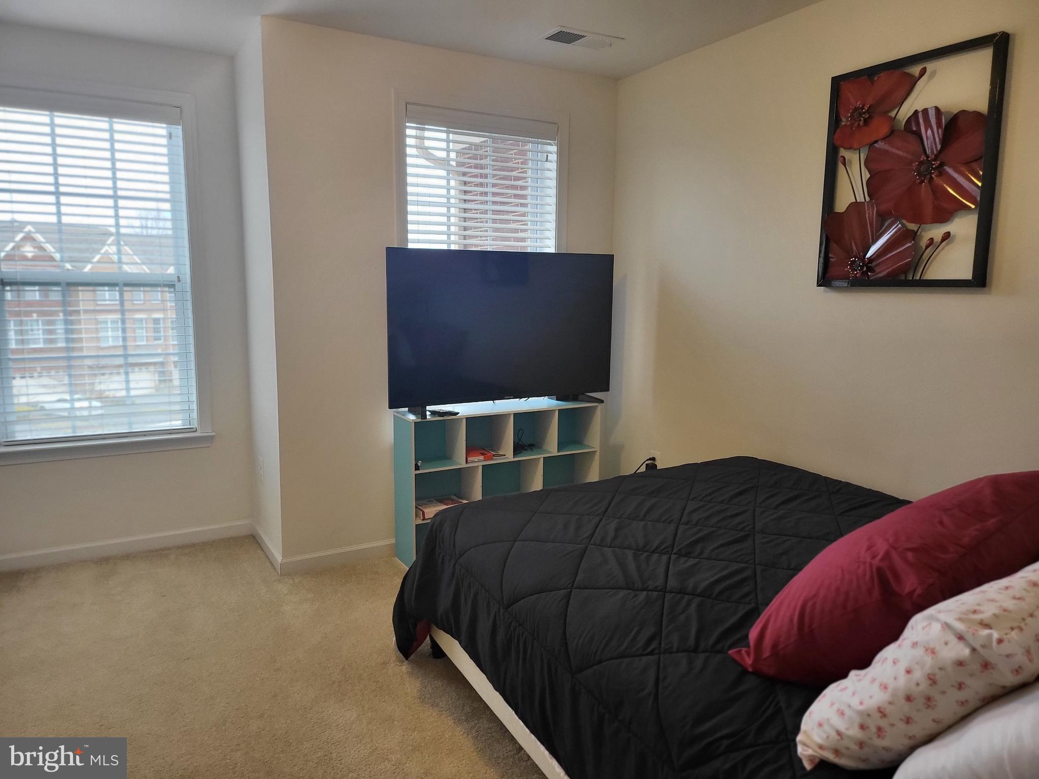 11011 Buggy Path Upper Marlboro, MD 20772 - Photo 40 of 82 a bedroom with a bed and window