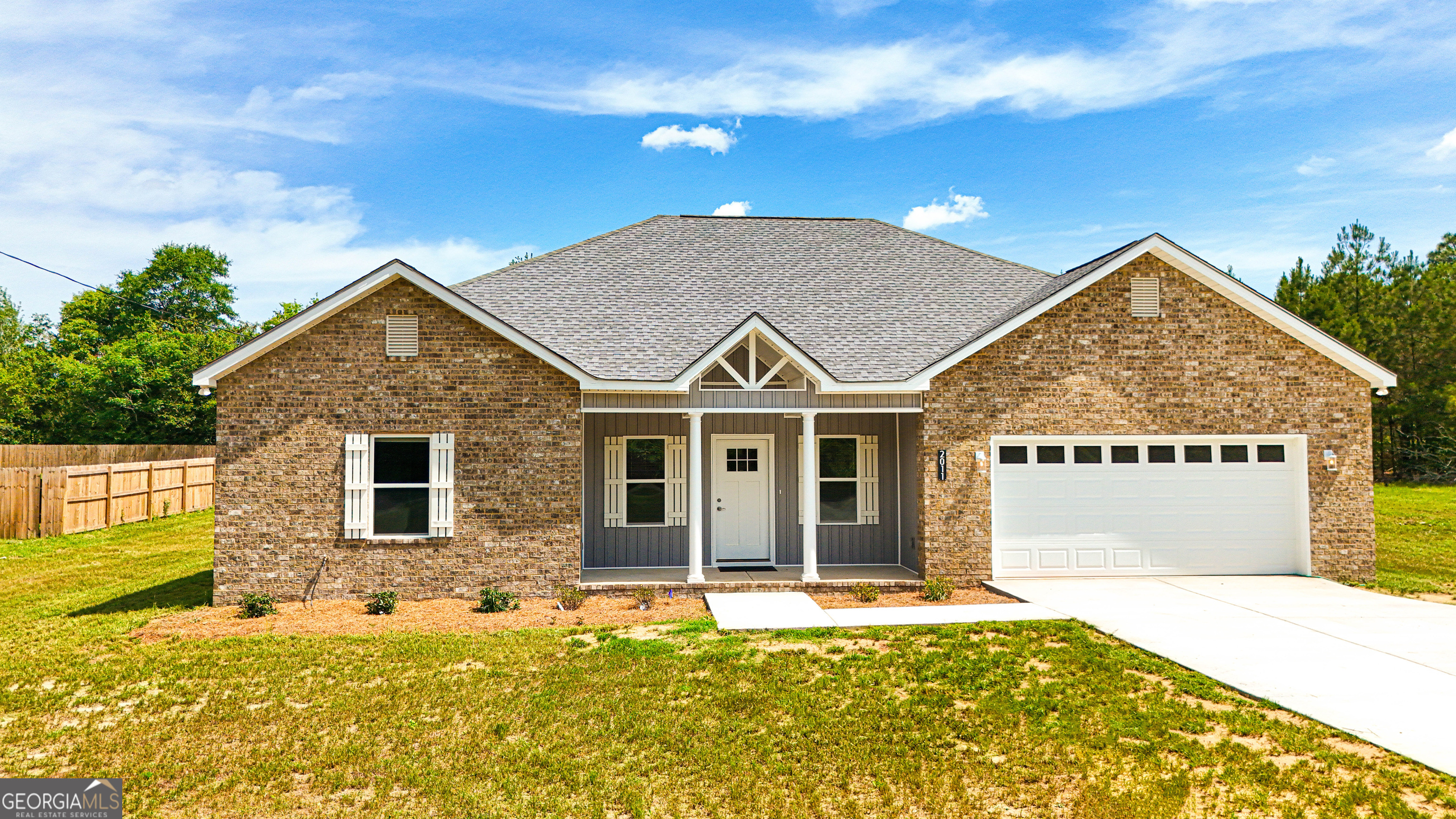 2011 Griffin Road Macon, GA 31216 - Photo 3 of 64 a view of a house with a swimming pool