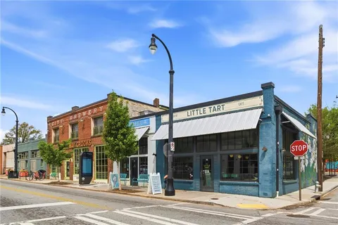 a view of a building on a street