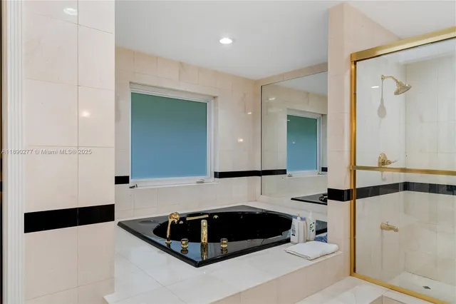 a bathroom with a sink a mirror and a toilet