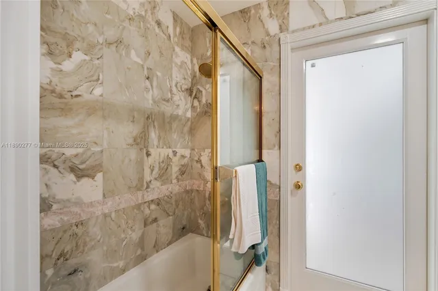 a bedroom with a bed and a chair