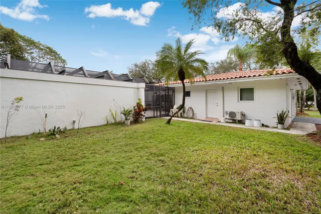 a view of a yard with an trees