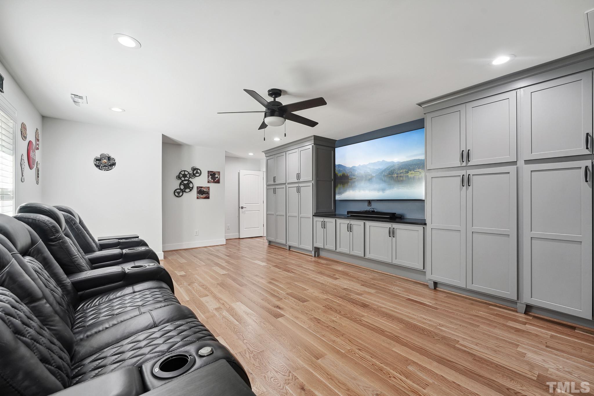 2632 Purnell Road Wake Forest, NC 27587 - Photo 14 of 60 a living room with furniture and a flat screen tv