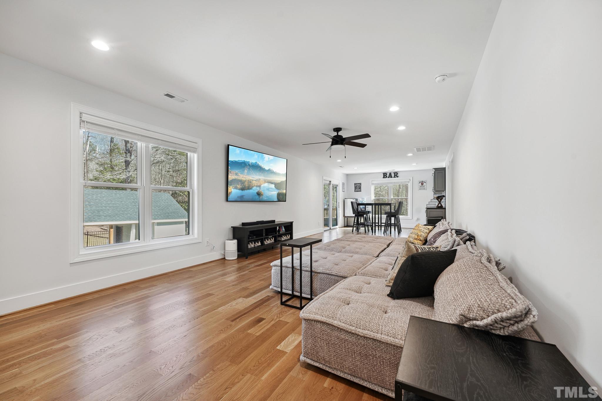 2632 Purnell Road Wake Forest, NC 27587 - Photo 30 of 60 a living room with furniture and a window