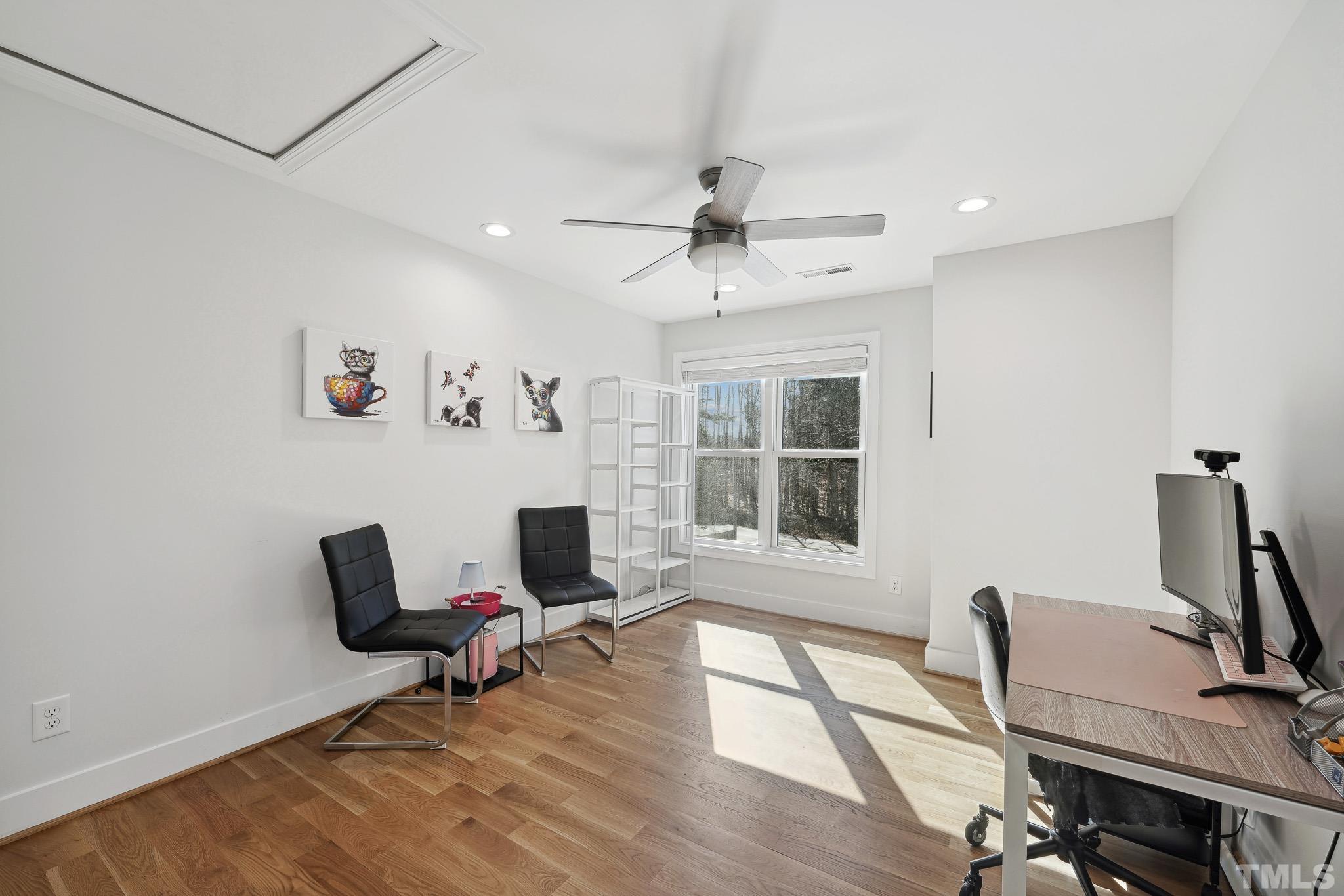 2632 Purnell Road Wake Forest, NC 27587 - Photo 36 of 60 a view of a workspace with furniture and a window