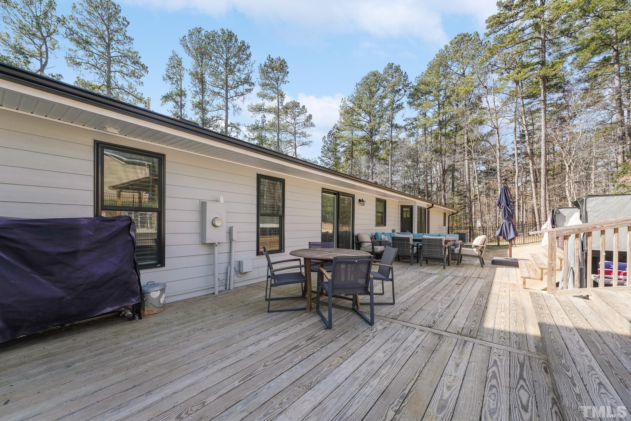 2632 Purnell Road Wake Forest, NC 27587 - Photo 41 of 60 a view of a house with backyard and sitting area