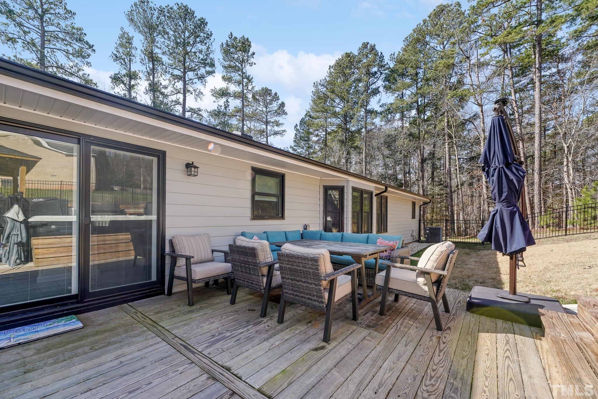 2632 Purnell Road Wake Forest, NC 27587 - Photo 42 of 60 a view of a house with backyard porch and sitting area