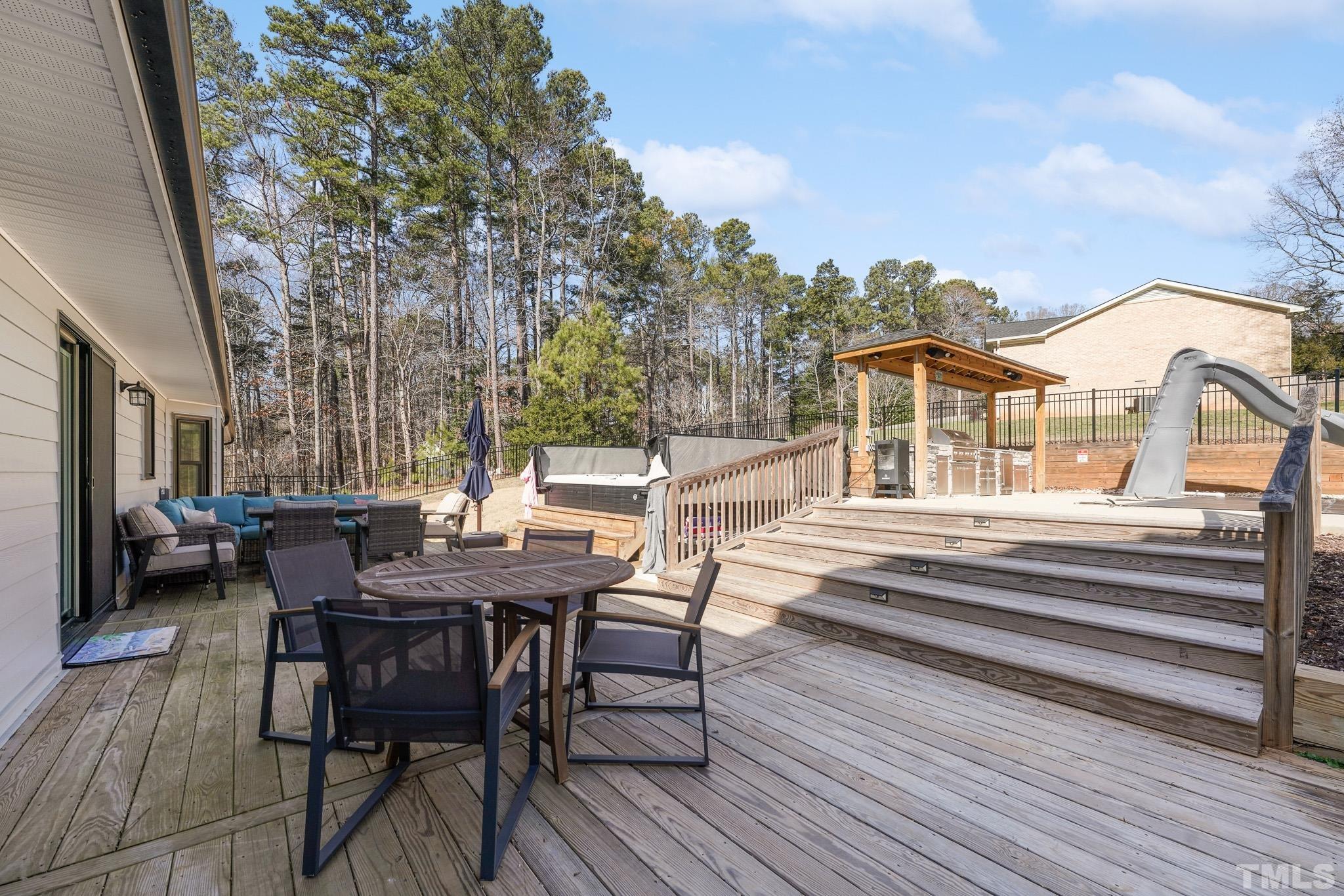 2632 Purnell Road Wake Forest, NC 27587 - Photo 43 of 60 a view of a house with backyard and sitting area