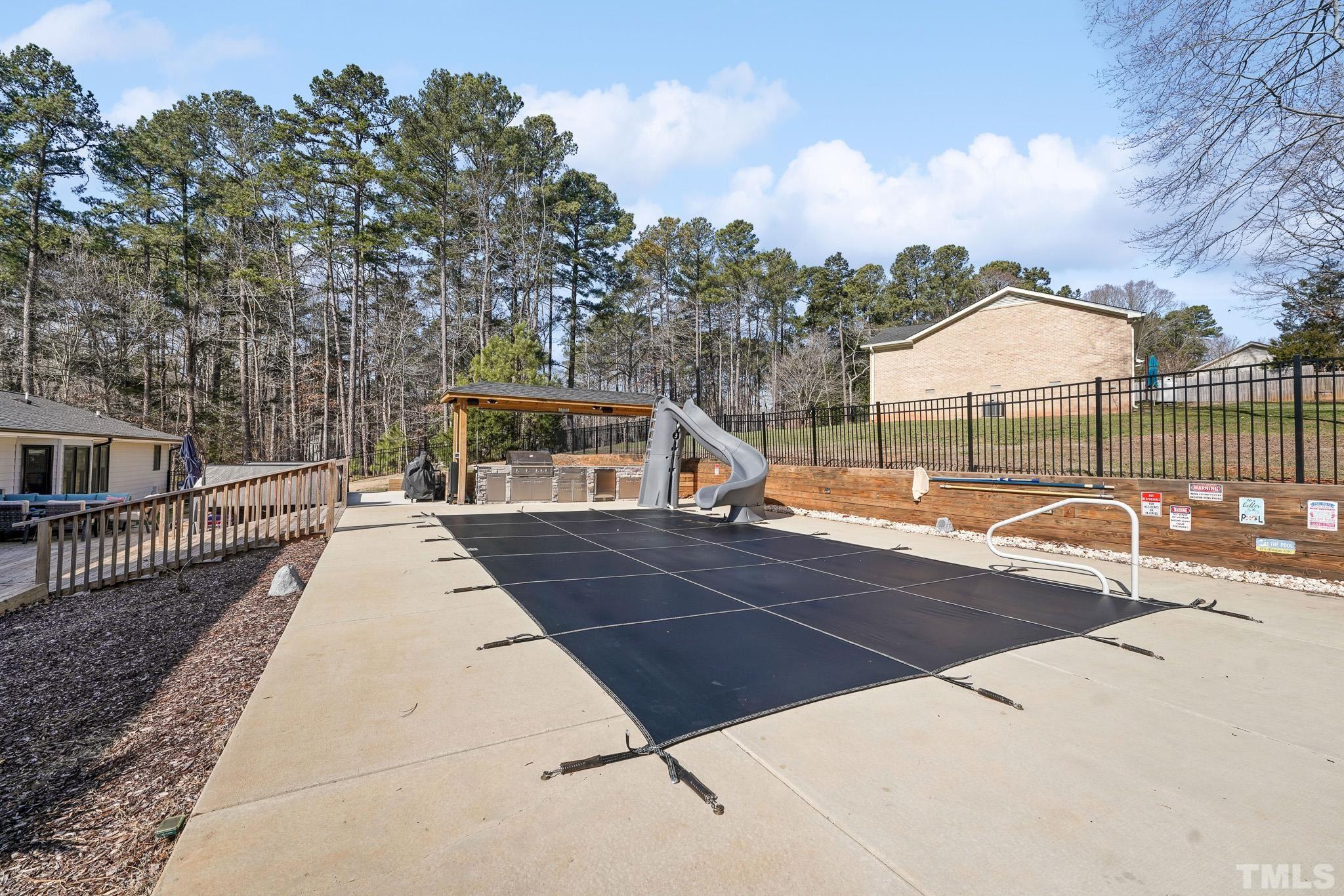 2632 Purnell Road Wake Forest, NC 27587 - Photo 50 of 60 a view of a tennis ground with large trees