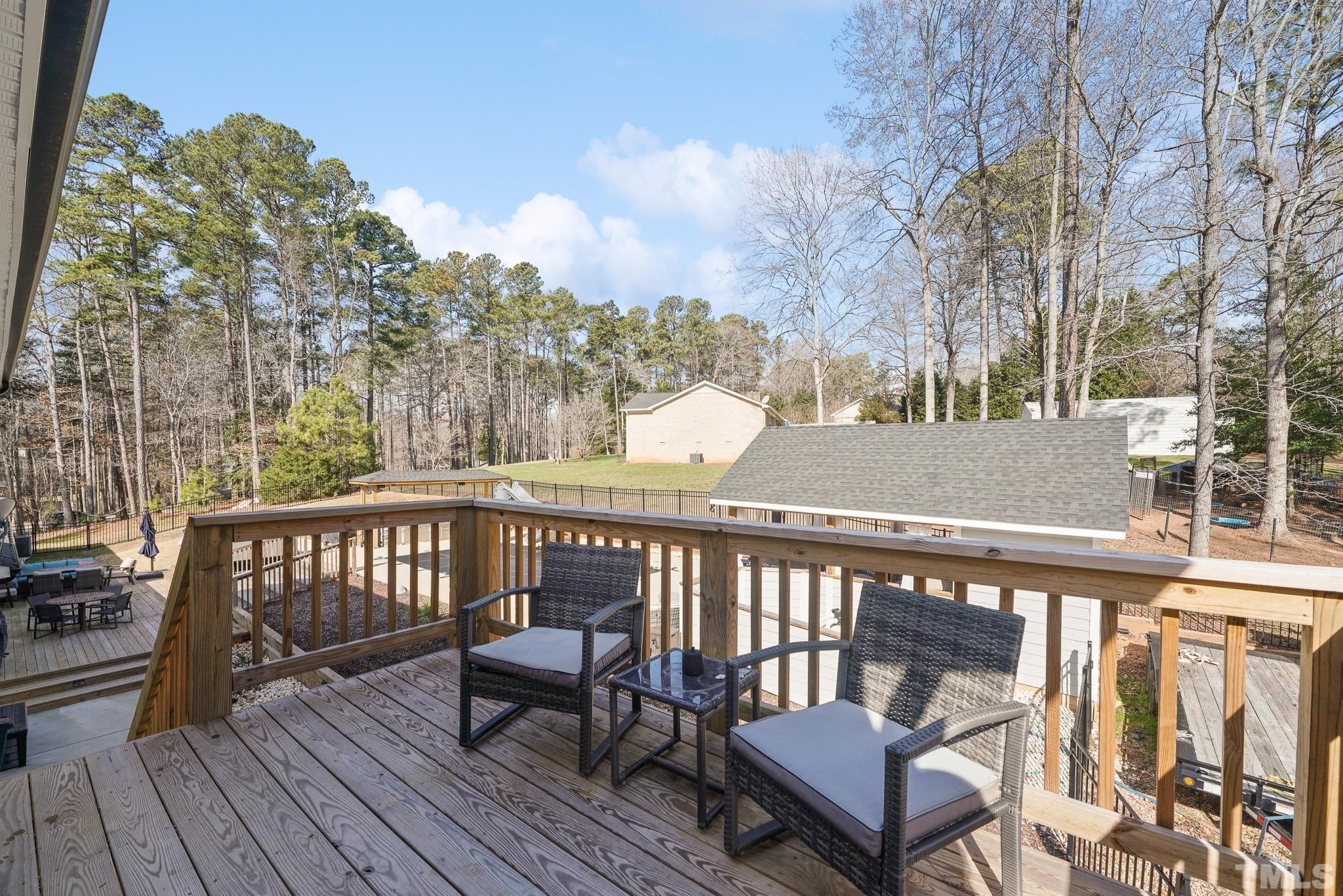 2632 Purnell Road Wake Forest, NC 27587 - Photo 54 of 60 a view of a two chairs on the roof deck