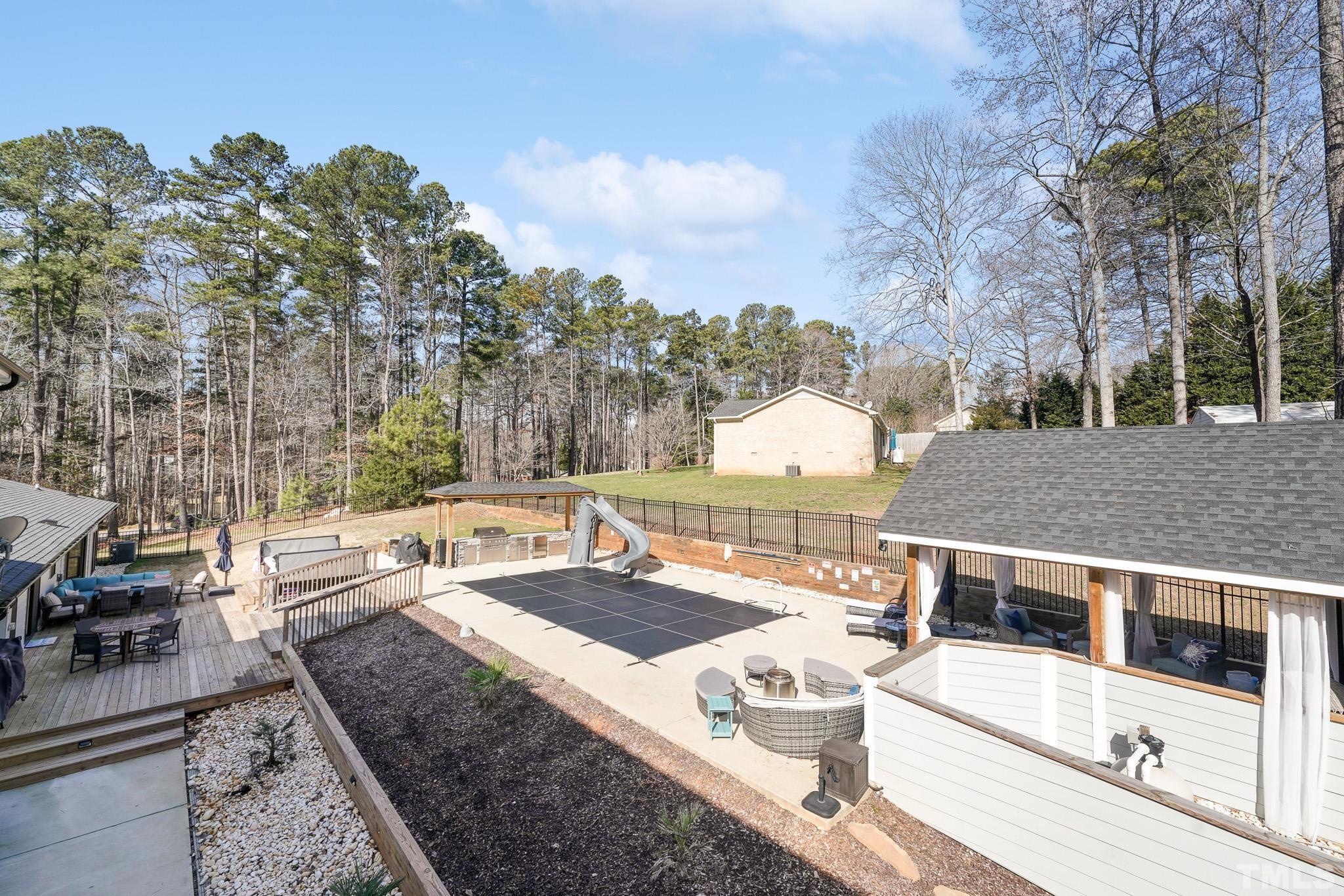 2632 Purnell Road Wake Forest, NC 27587 - Photo 55 of 60 a view of a house with backyard and sitting area