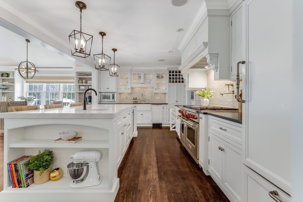85 Old Farm Road Milton, MA 02186 - Photo 4 of 42 a kitchen with counter top space and stainless steel appliances