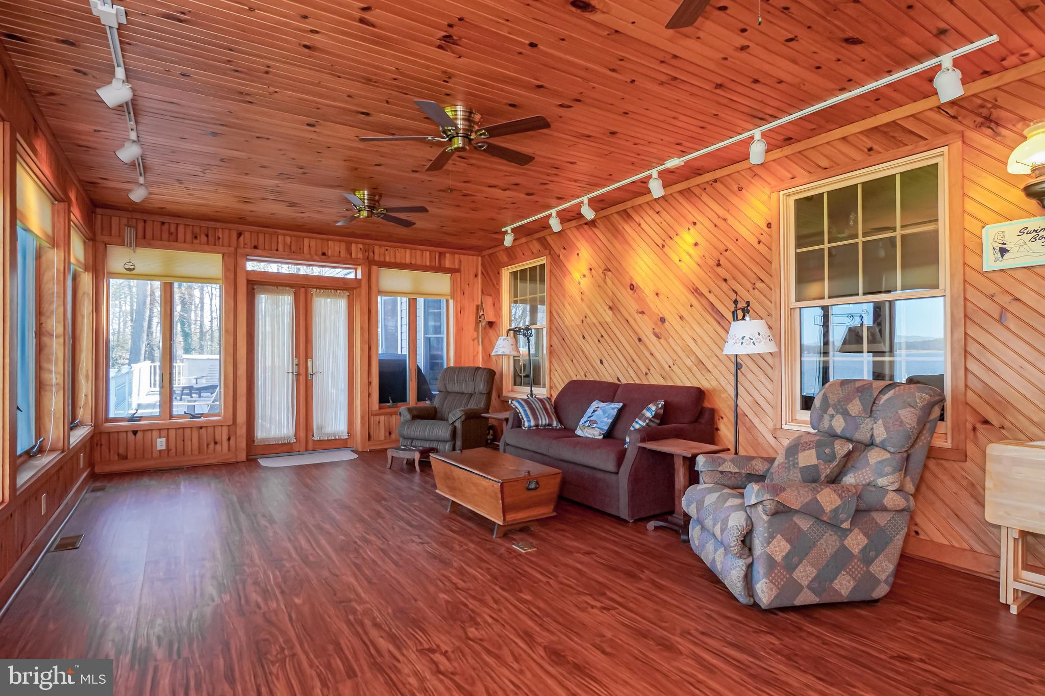 1735 Elk Forest Road Elkton, MD 21921 - Photo 17 of 43 Sun room with french doors leading to deck and spa