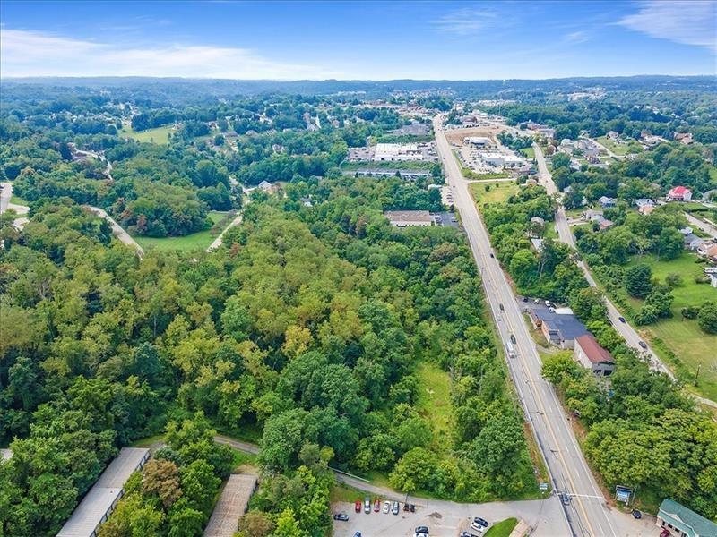 0 East Route 30 Irwin, PA 15642 - Photo 6 of 14 an aerial view of residential houses with outdoor space and trees