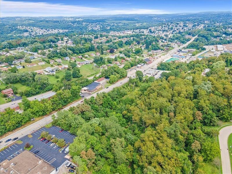 0 East Route 30 Irwin, PA 15642 - Photo 10 of 14 a view of a city with lush green forest