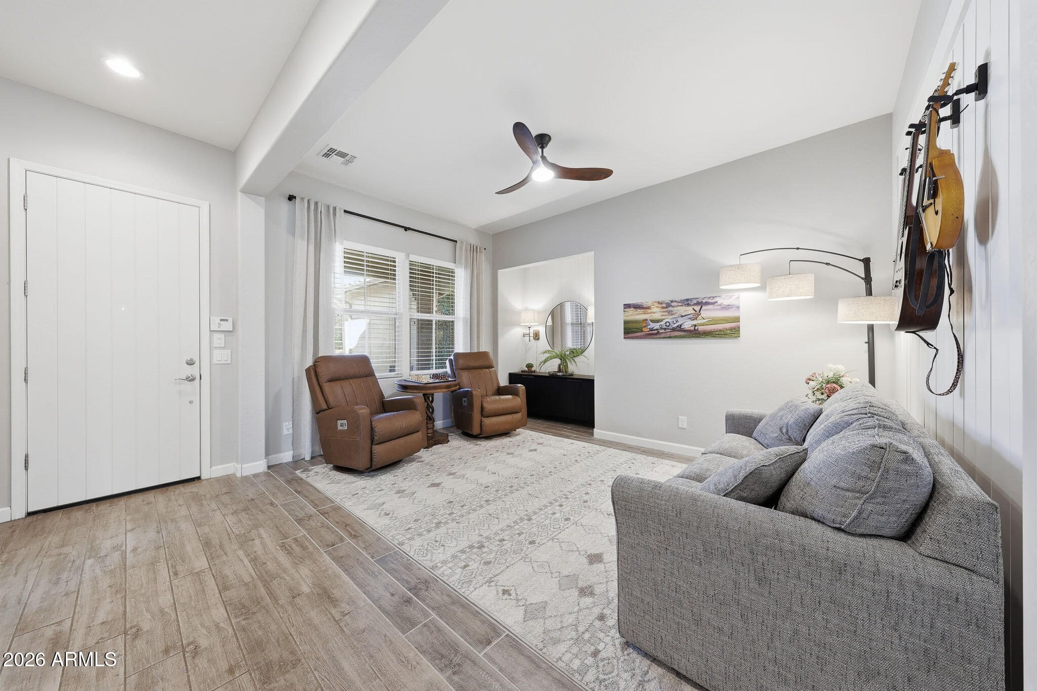 22133 East Russet Road Queen Creek, AZ 85142 - Photo 12 of 61 a living room with furniture and a window