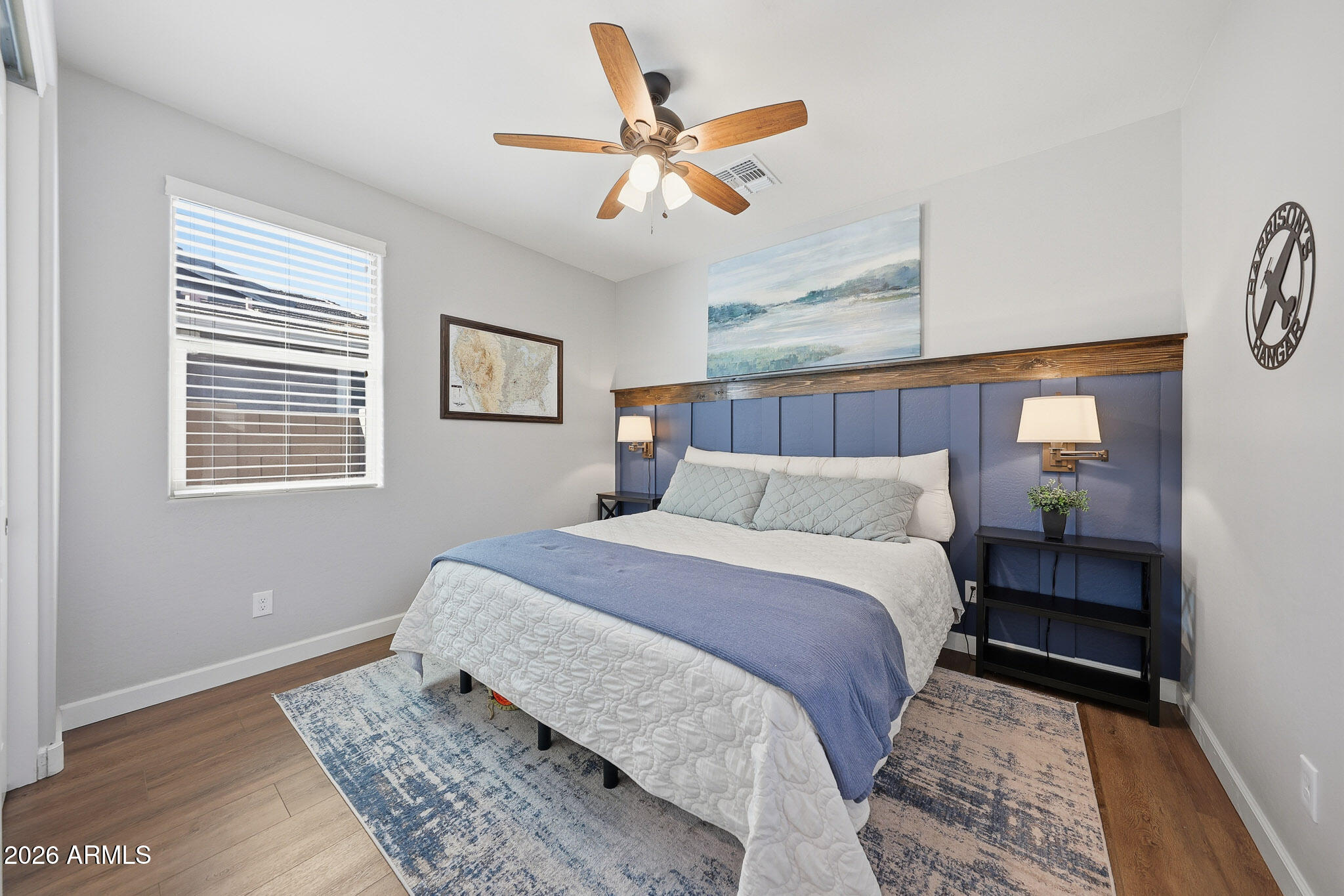22133 East Russet Road Queen Creek, AZ 85142 - Photo 13 of 61 a bedroom with a large bed and a window