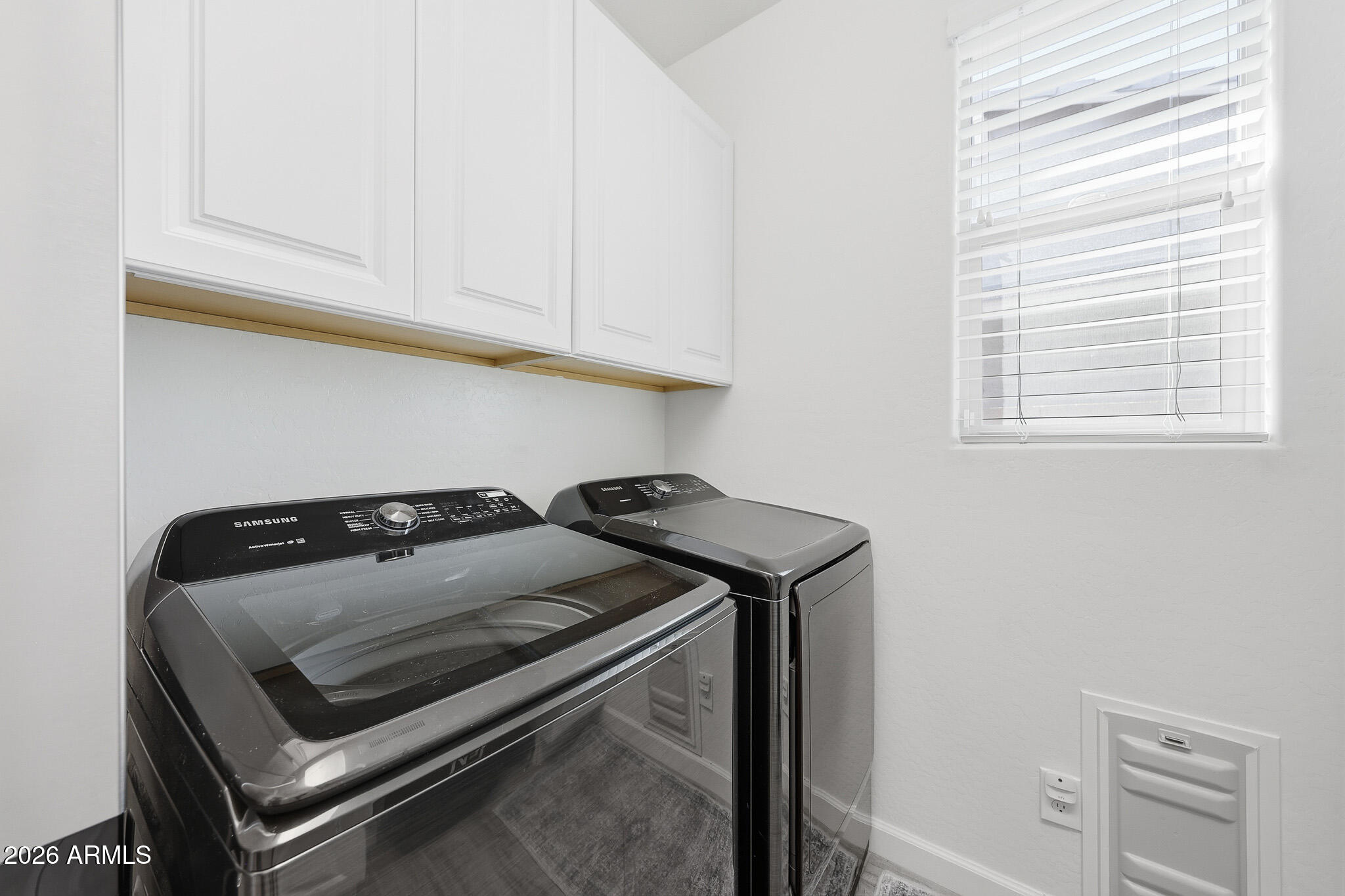 22133 East Russet Road Queen Creek, AZ 85142 - Photo 17 of 61 a utility room with dryer and washer