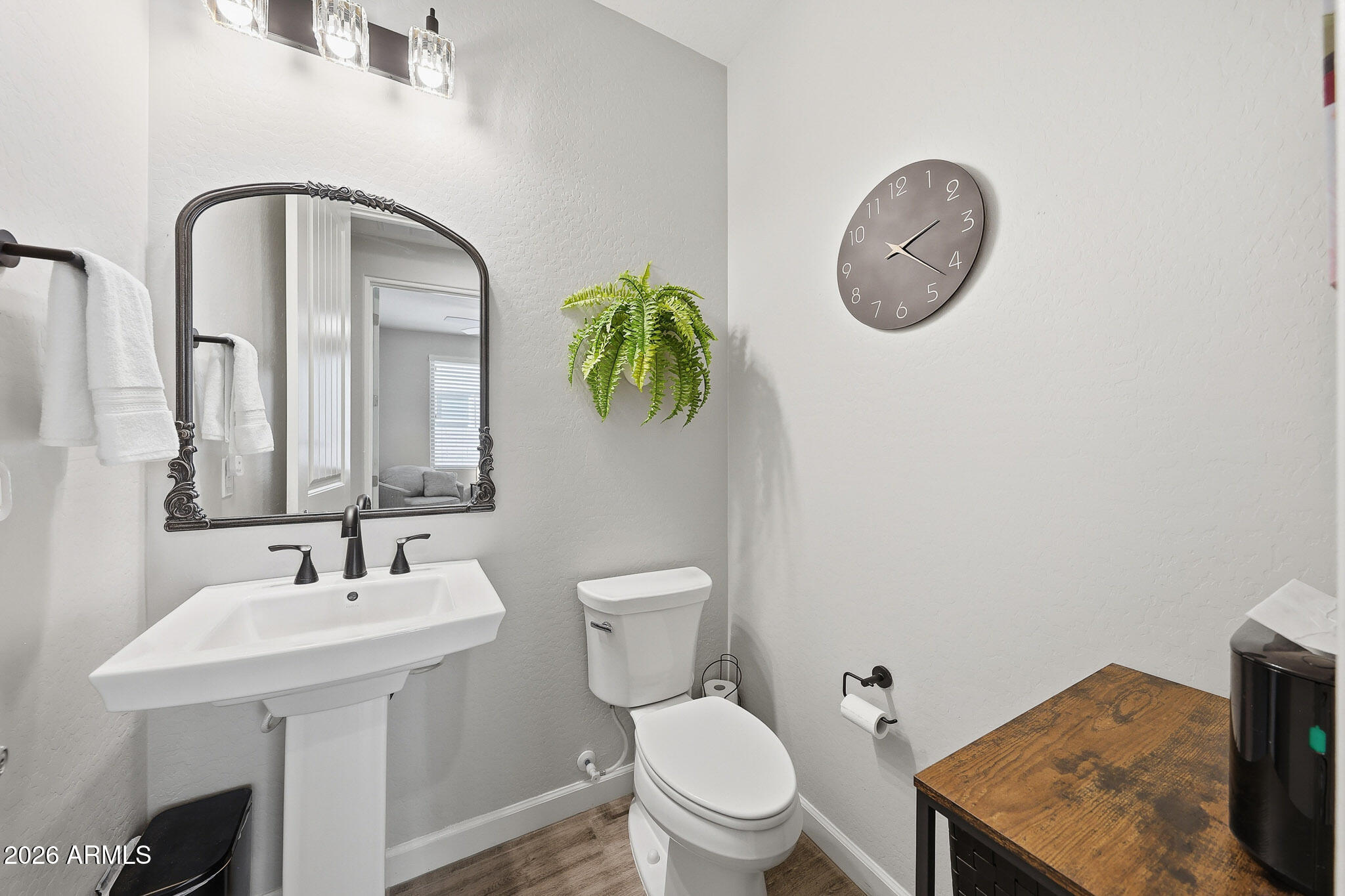 22133 East Russet Road Queen Creek, AZ 85142 - Photo 28 of 61 a bathroom with a toilet sink and mirror