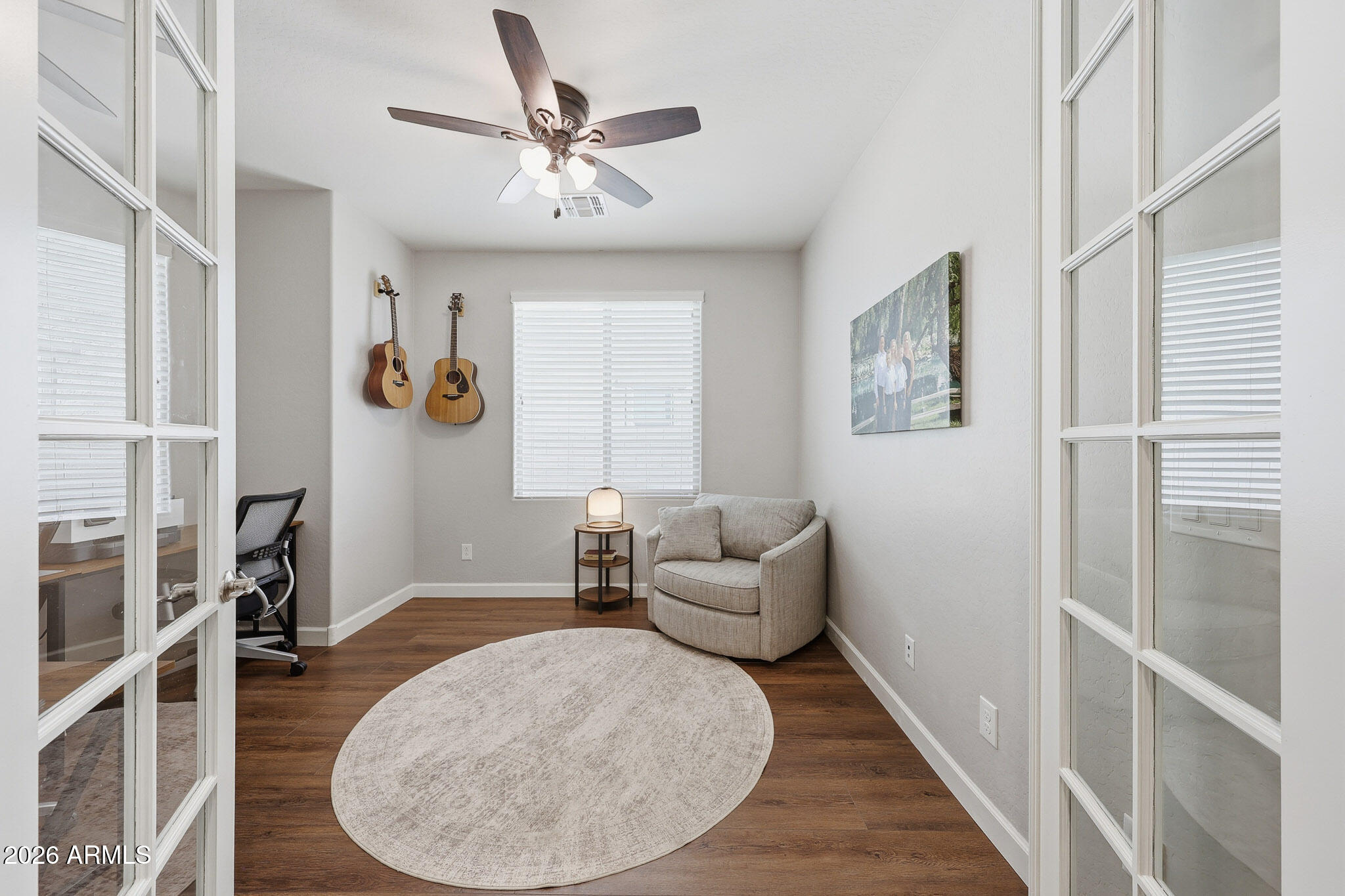 22133 East Russet Road Queen Creek, AZ 85142 - Photo 30 of 61 a living room with furniture and a wooden floor