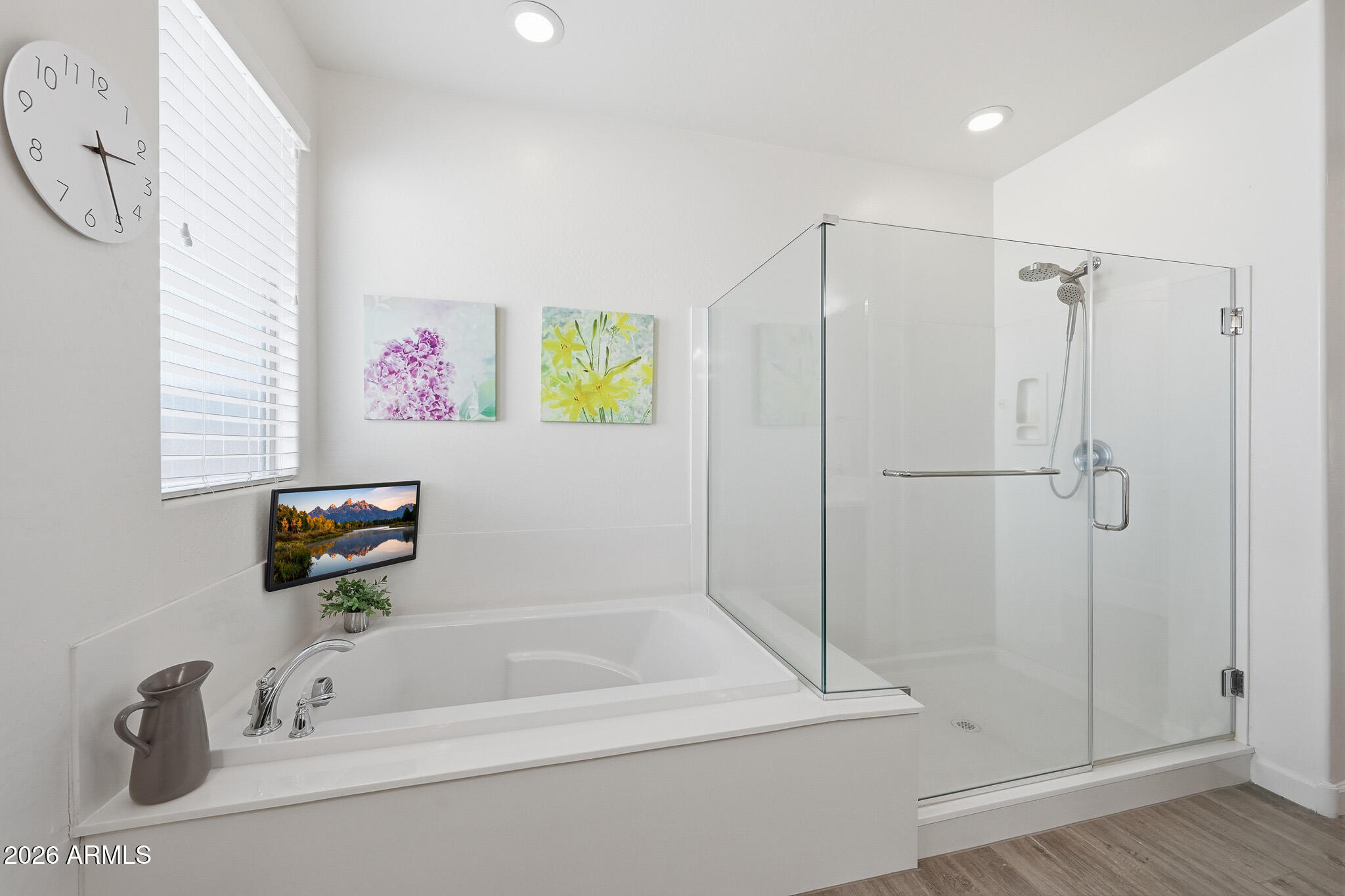 22133 East Russet Road Queen Creek, AZ 85142 - Photo 33 of 61 a bathroom with a tub and a shower