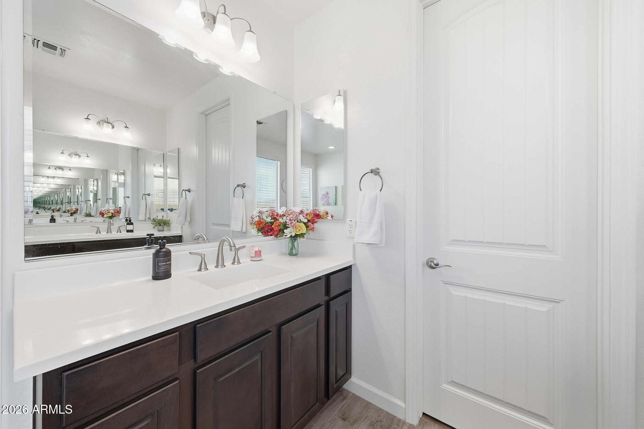 22133 East Russet Road Queen Creek, AZ 85142 - Photo 35 of 61 a bathroom with a sink double vanity and a mirror