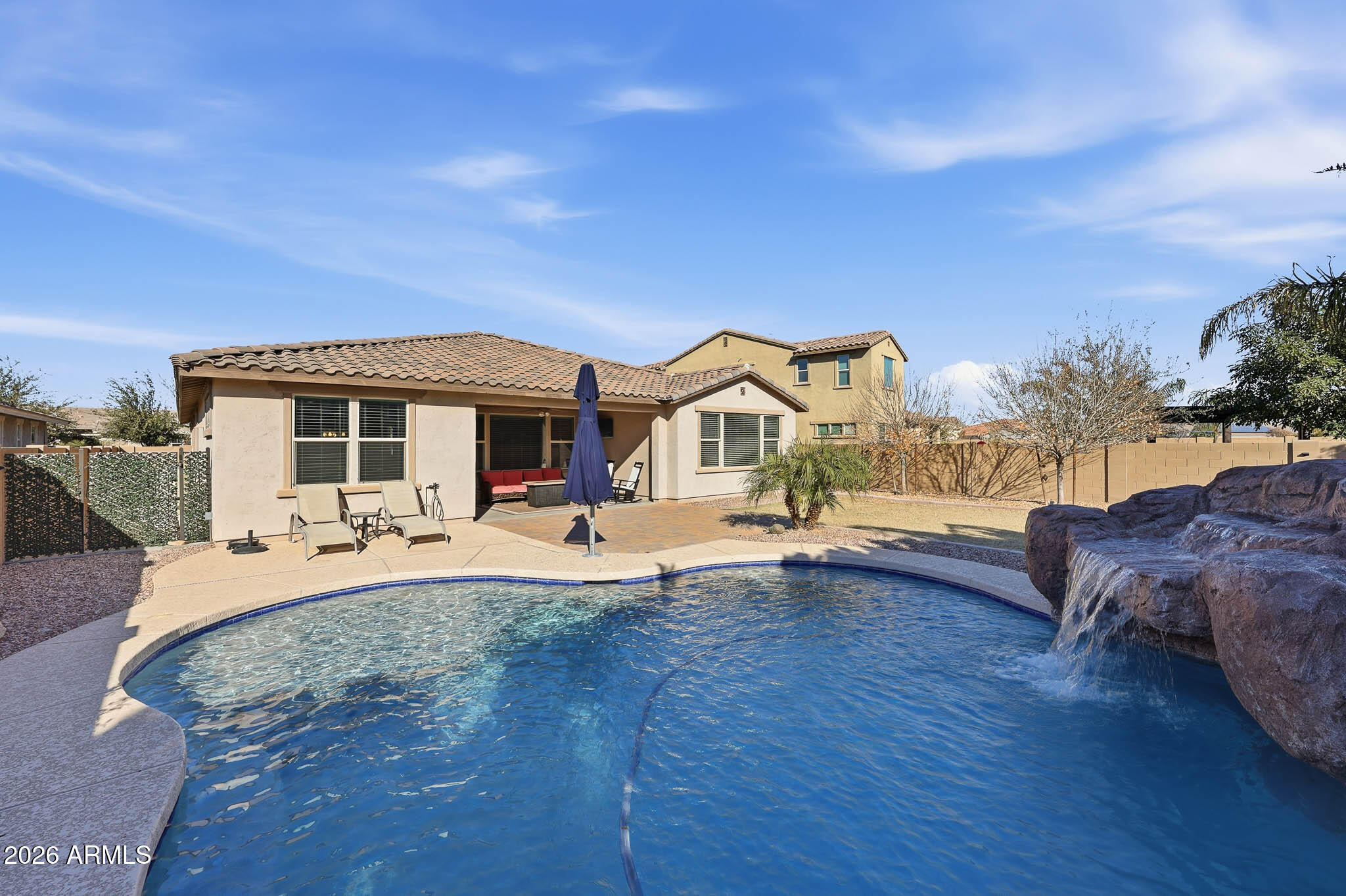 22133 East Russet Road Queen Creek, AZ 85142 - Photo 49 of 61 a front view of house with yard and seating area
