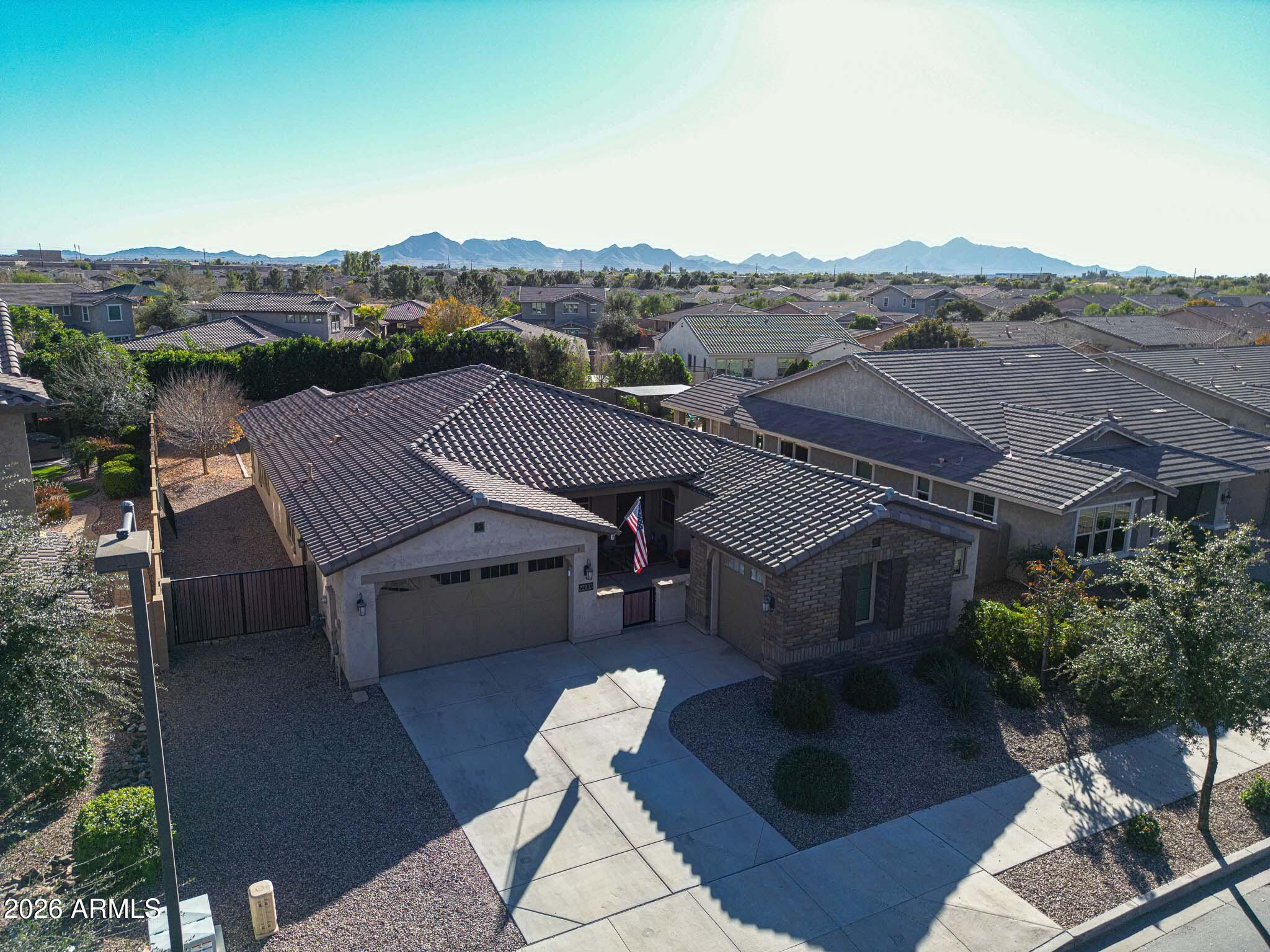 22133 East Russet Road Queen Creek, AZ 85142 - Photo 57 of 61 an aerial view of a house with a yard swimming pool and mountain view