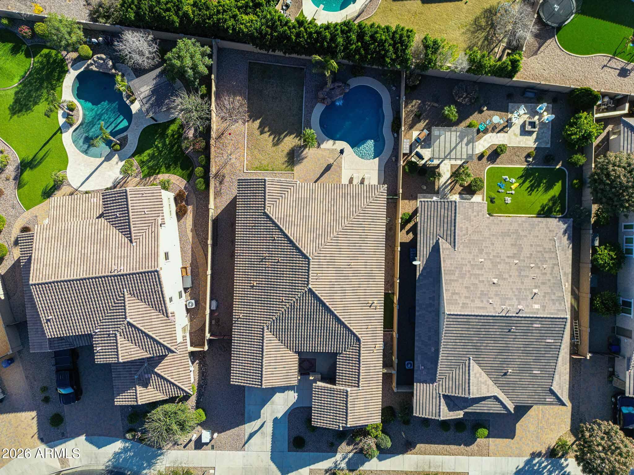 22133 East Russet Road Queen Creek, AZ 85142 - Photo 58 of 61 an aerial view of a house with balcony and patio