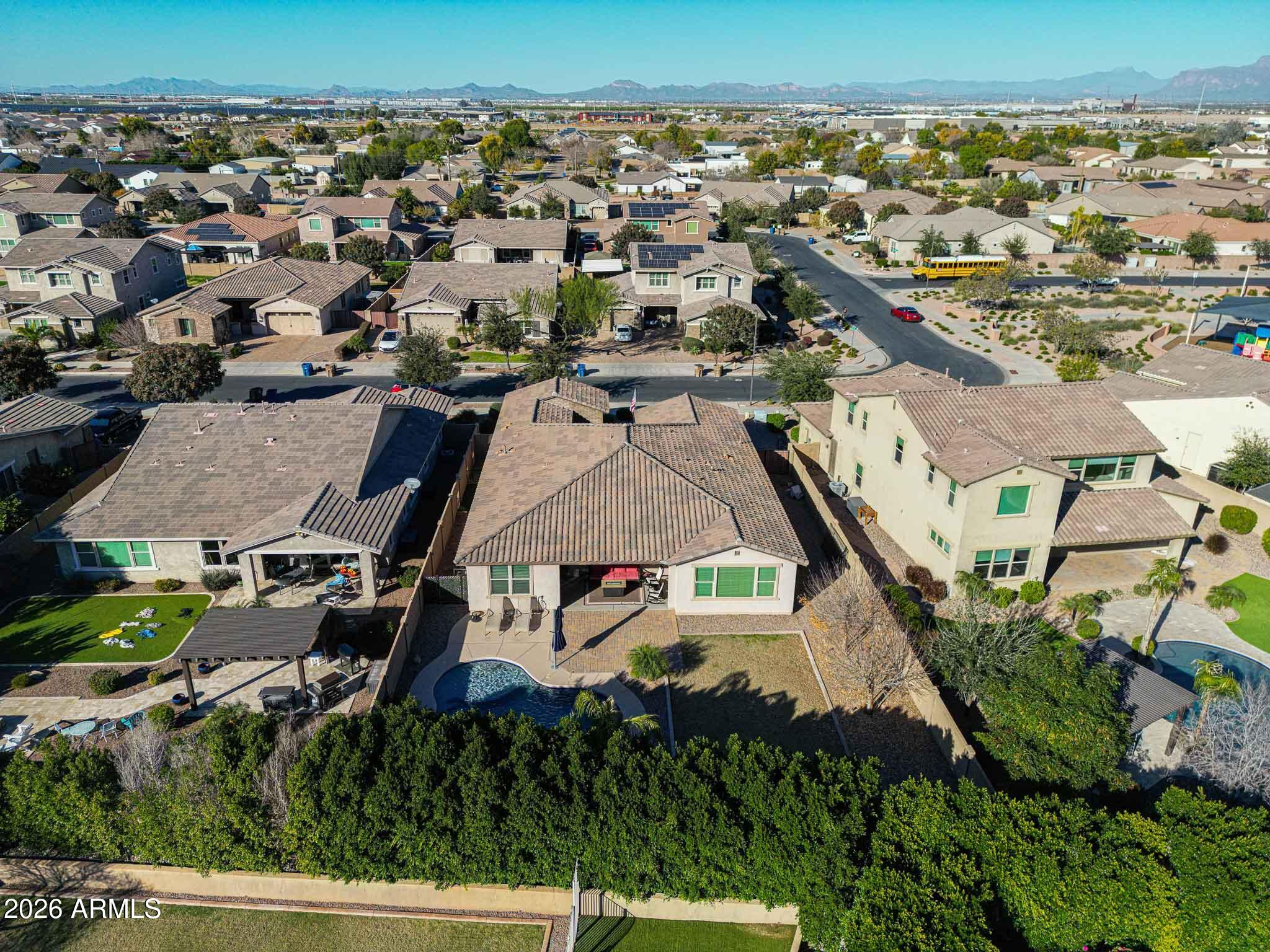 22133 East Russet Road Queen Creek, AZ 85142 - Photo 60 of 61 an aerial view of residential houses with outdoor space