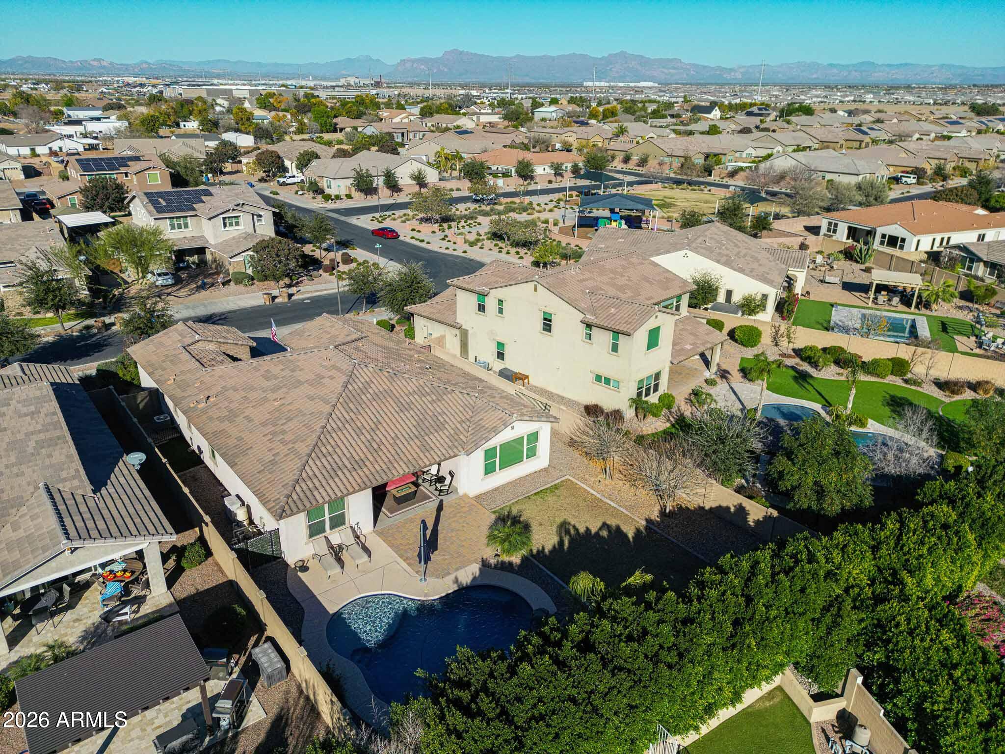 22133 East Russet Road Queen Creek, AZ 85142 - Photo 61 of 61 an aerial view of residential houses with outdoor space