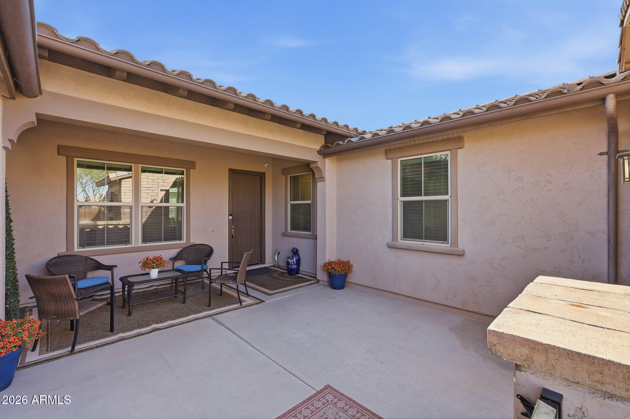 22133 East Russet Road Queen Creek, AZ 85142 - Photo 8 of 61 a building outdoor space with patio furniture