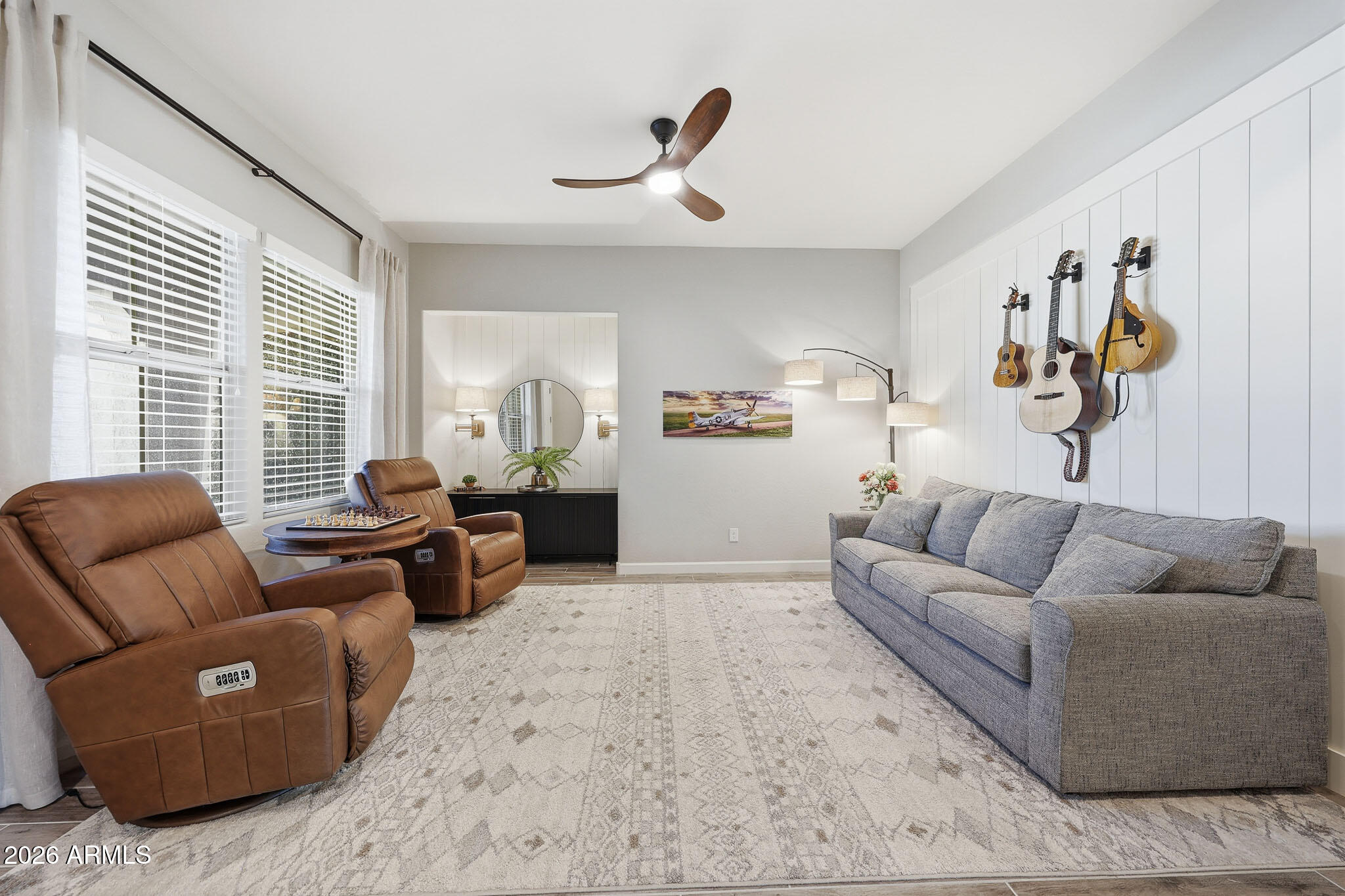 22133 East Russet Road Queen Creek, AZ 85142 - Photo 10 of 61 a living room with furniture and a window