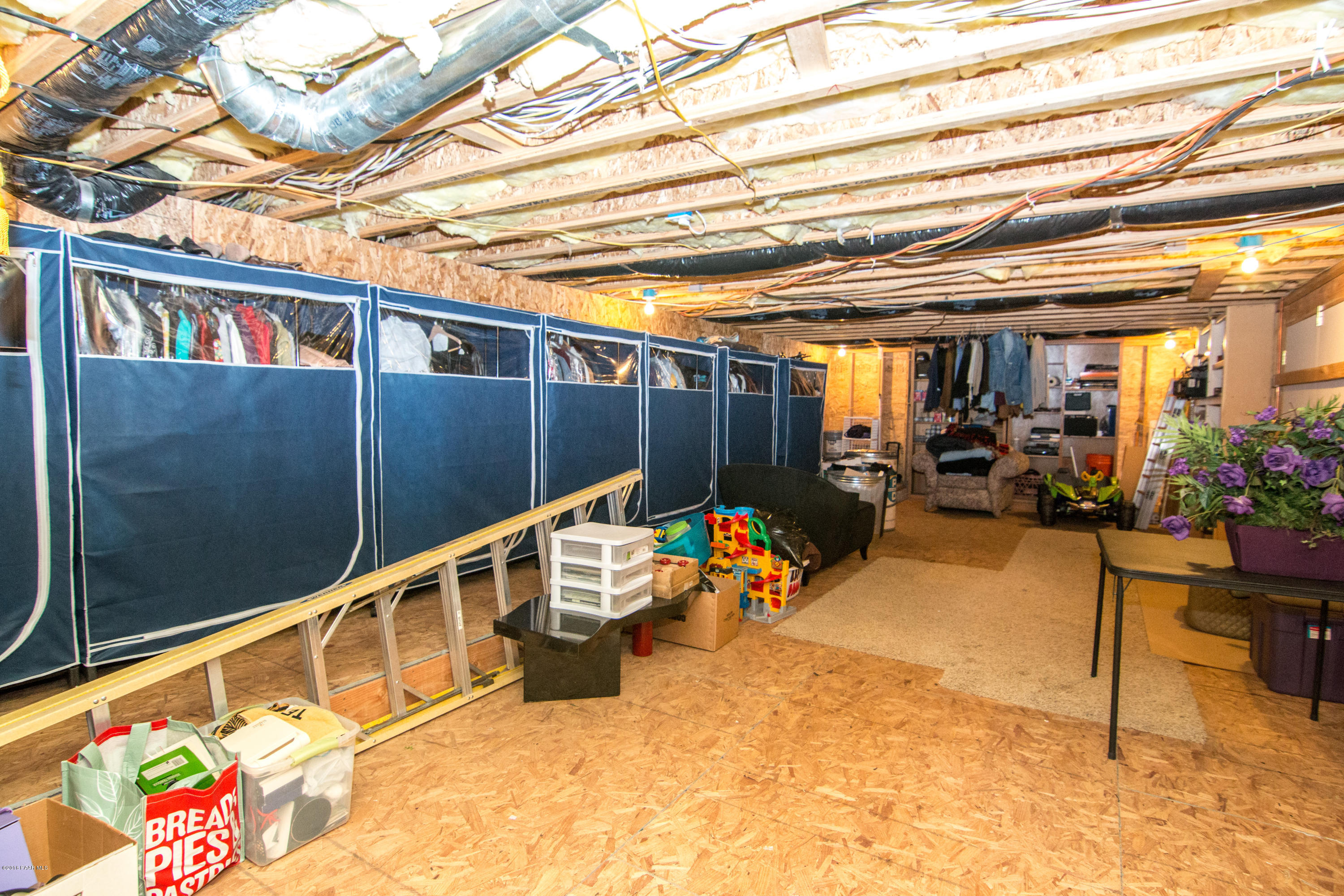 10612 North Sharps Road Prescott, AZ 86305 - Photo 47 of 83 Basement storage