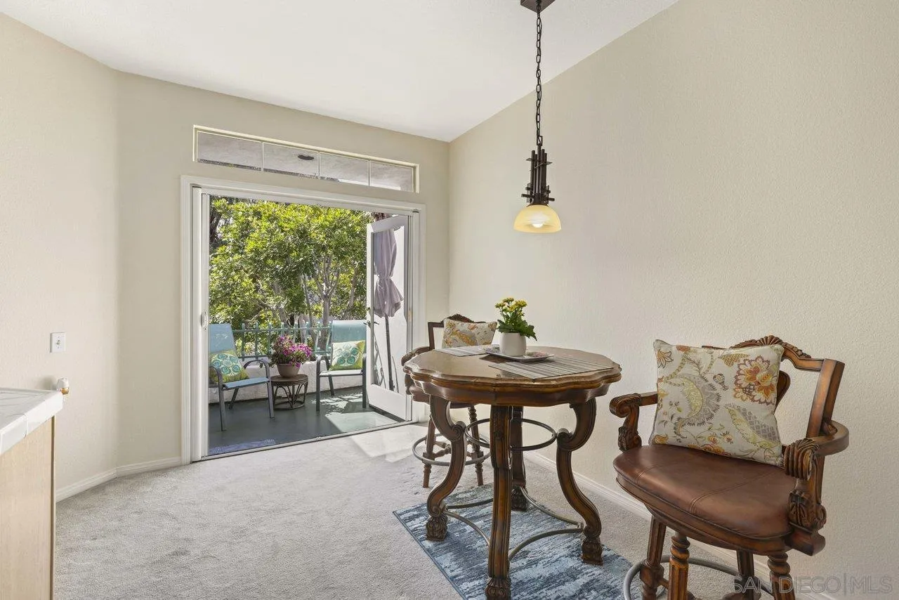 3365 Genoa Way, Unit 140 Oceanside, CA 92056 - Photo 16 of 32 a view of a workspace with furniture and a window