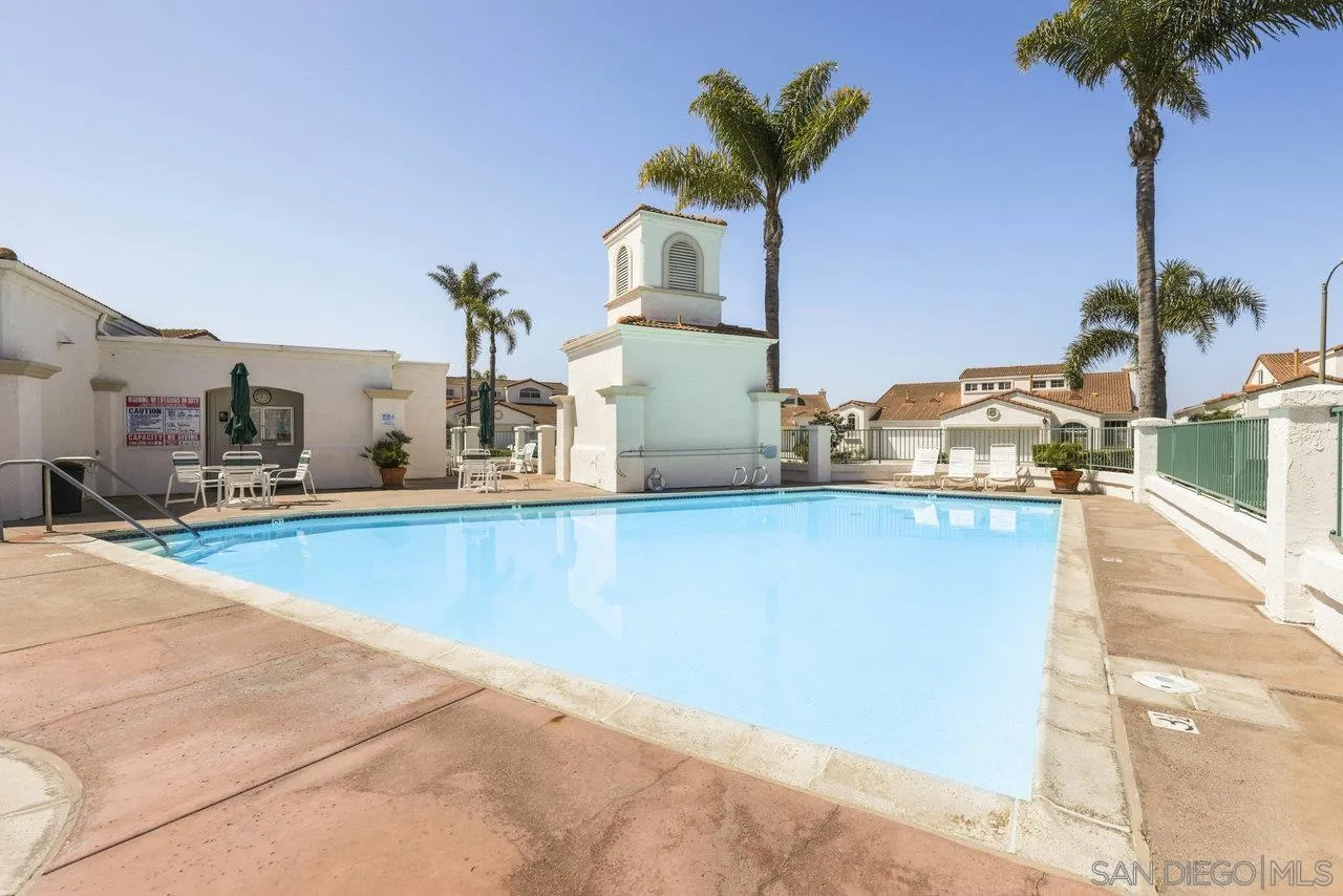 3365 Genoa Way, Unit 140 Oceanside, CA 92056 - Photo 29 of 32 a view of a living room and kitchen