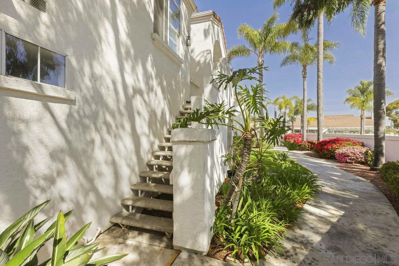 3365 Genoa Way, Unit 140 Oceanside, CA 92056 - Photo 3 of 32 a vase of flowers sitting on a floor