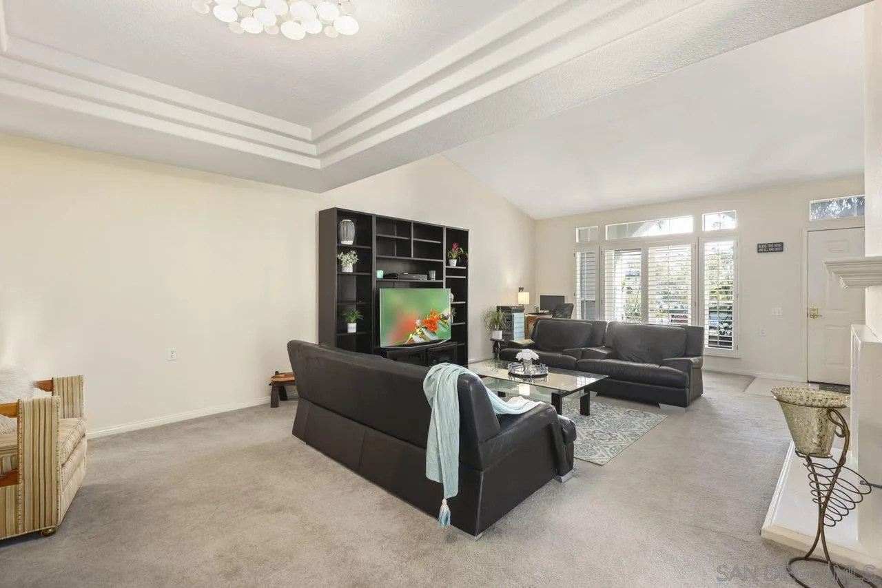 3365 Genoa Way, Unit 140 Oceanside, CA 92056 - Photo 8 of 32 a living room with furniture and a window