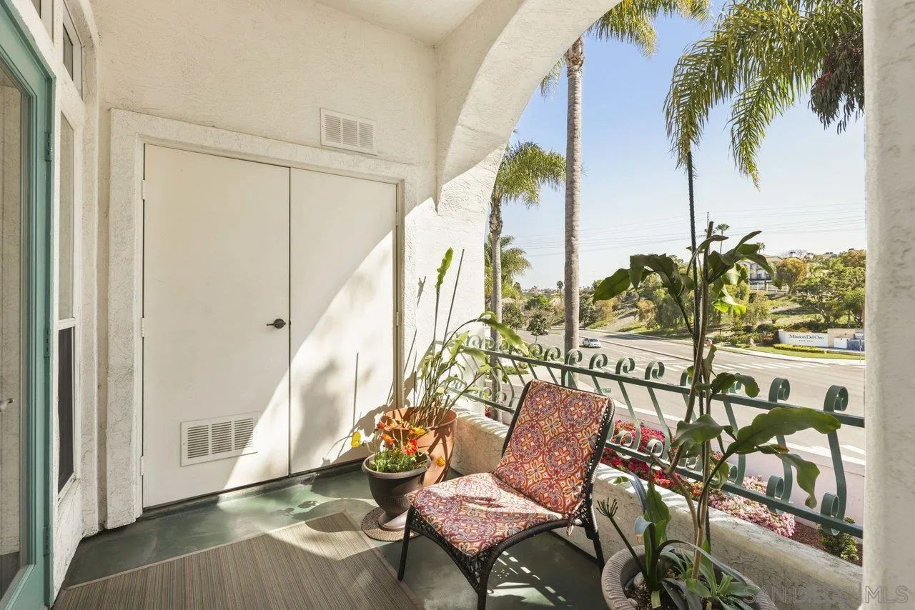3365 Genoa Way, Unit 140 Oceanside, CA 92056 - Photo 10 of 32 a balcony with furniture and a potted plant