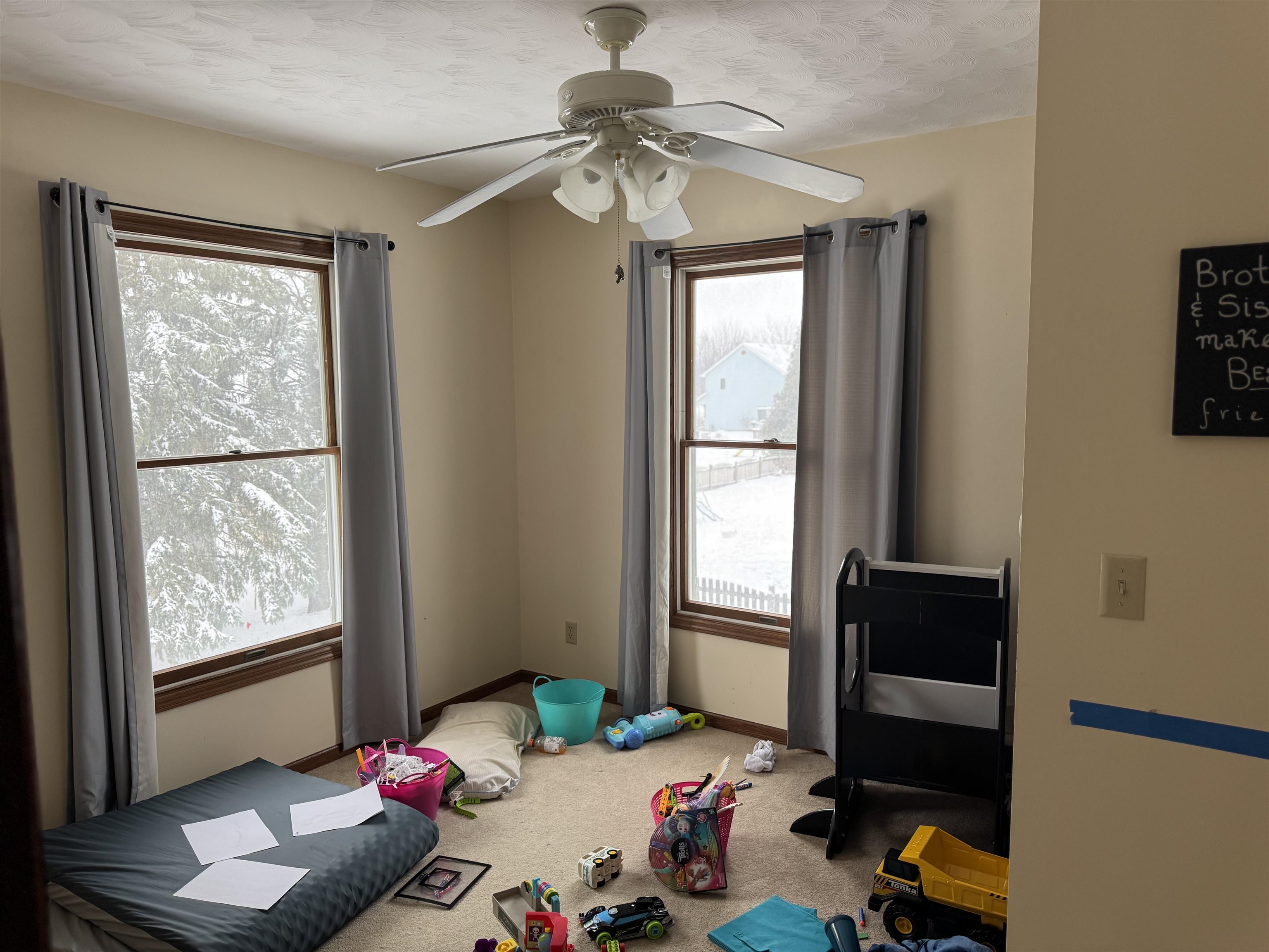 1401 Carrie Avenue Rochelle, IL 61068 - Photo 11 of 13 a bedroom with a bed and a window